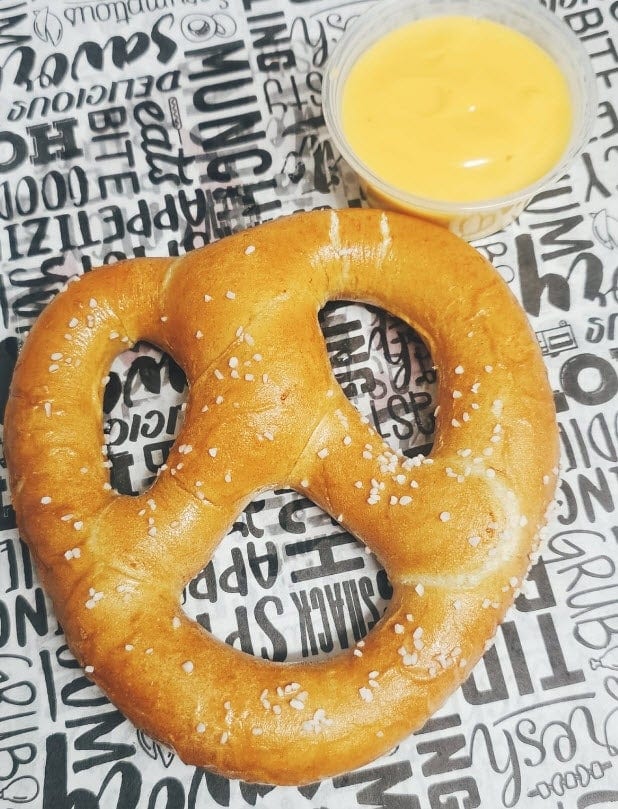 Salted Pretzel with Cheese Dip.