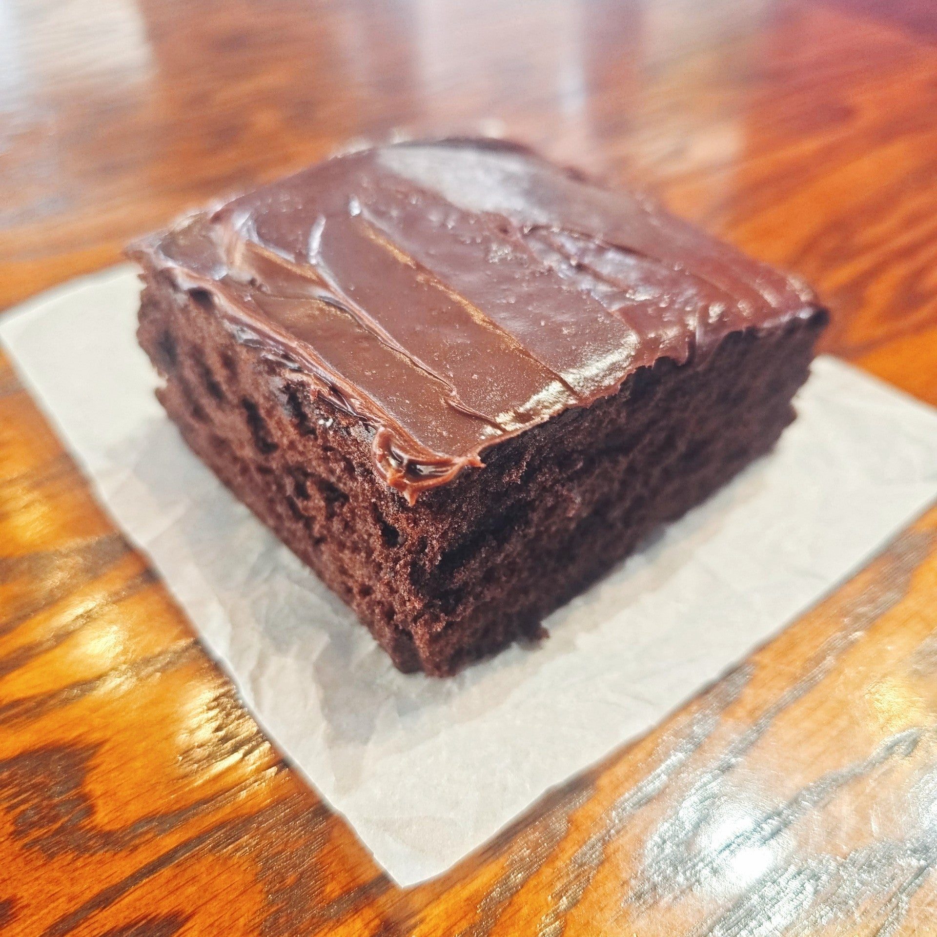 Chocolate Cake Slice W/ Chocolate Icing.