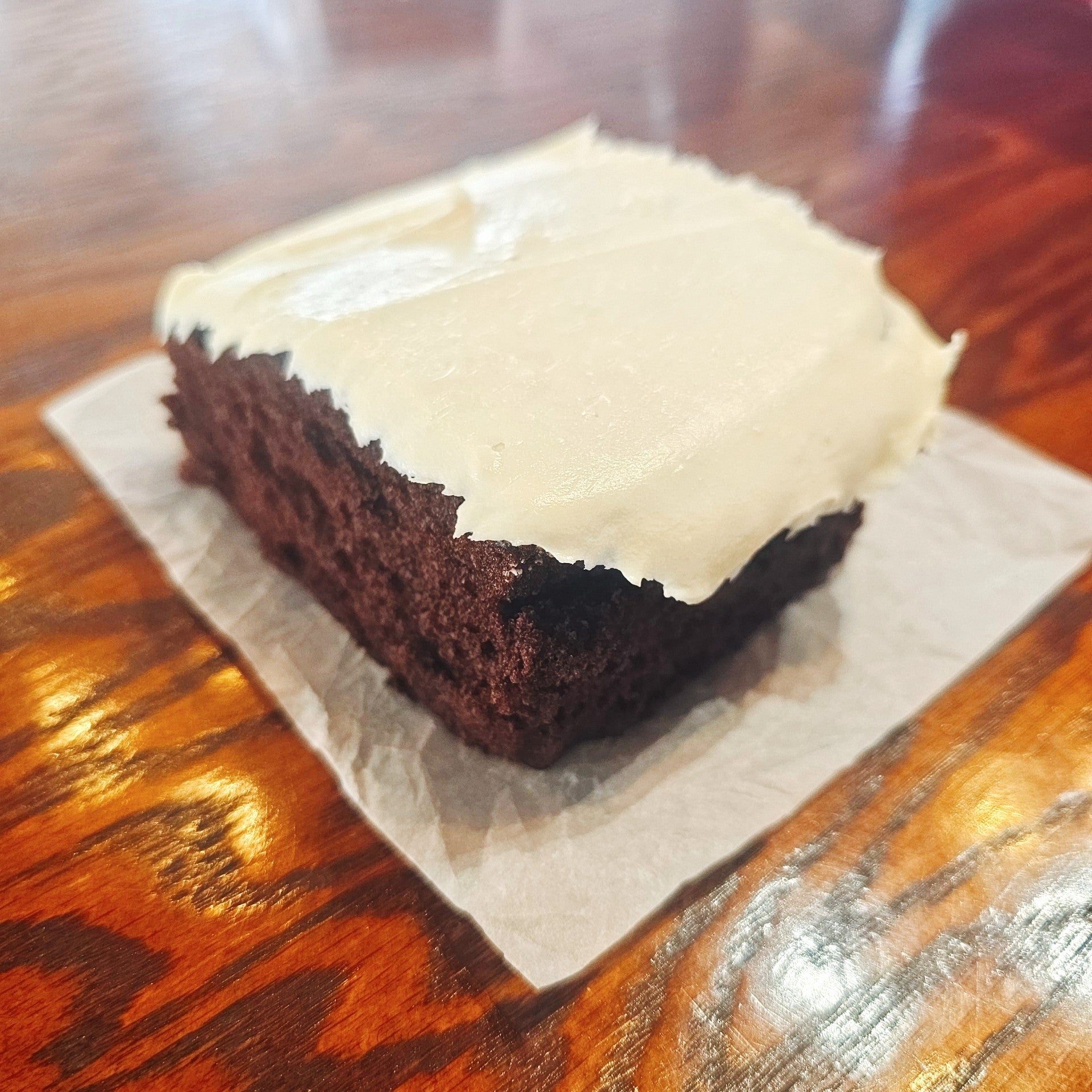 Chocolate Cake Slice w/Butter Cream Frosting.